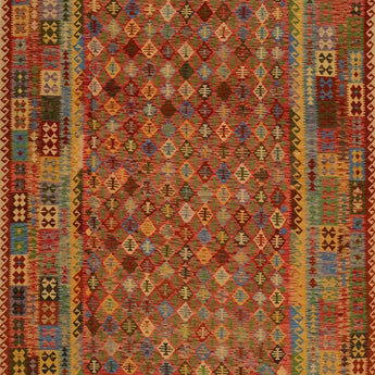A woven kelim carpet, various colors are used, mainly orange