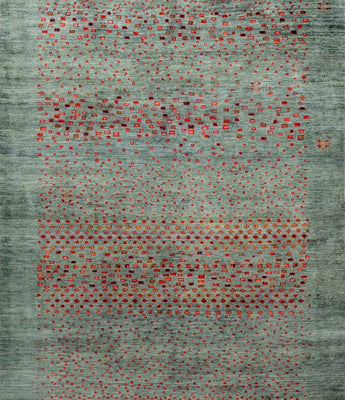 A gabbeh carpet in blue/turquoise with red dots